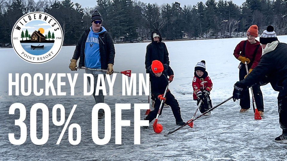 Hockey Day MN 30% off at Wilderness Point Resort – kids playing broomball on frozen Middle Cullen Lake